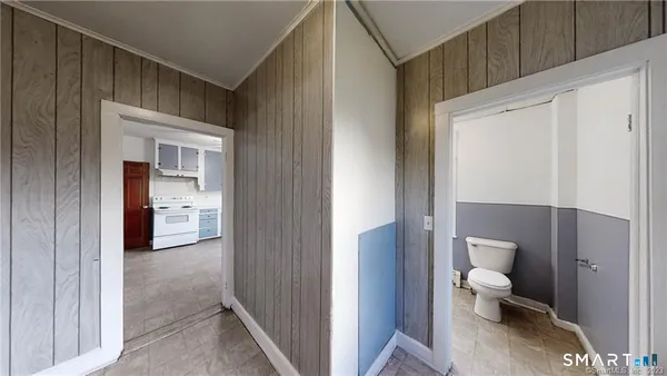 a bathroom with a sink a mirror and a toilet