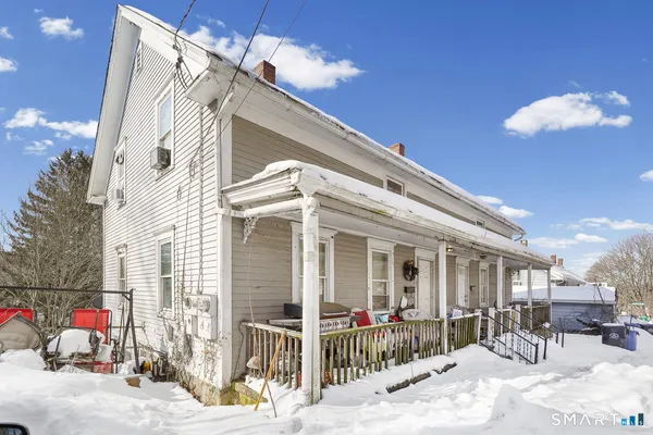 a view of a house with a patio