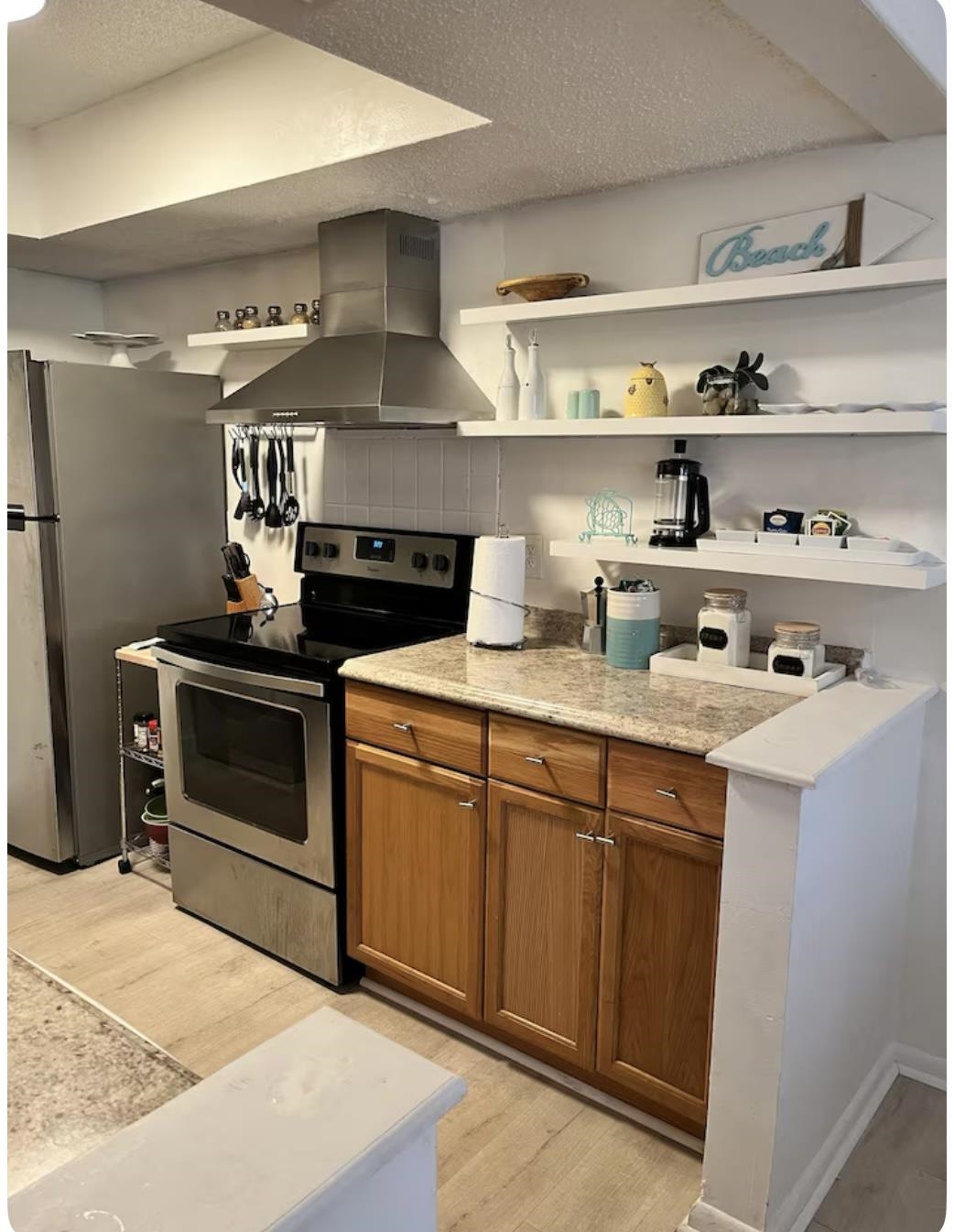 6300 A1A South St. Augustine, FL 32080 - Photo 16 of 19 a kitchen with stainless steel appliances granite countertop a stove and a cabinets