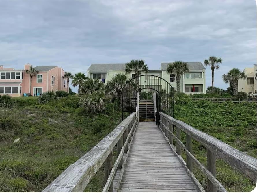 6300 A1A South St. Augustine, FL 32080 - Photo 4 of 19 a view of a house with wooden balcony