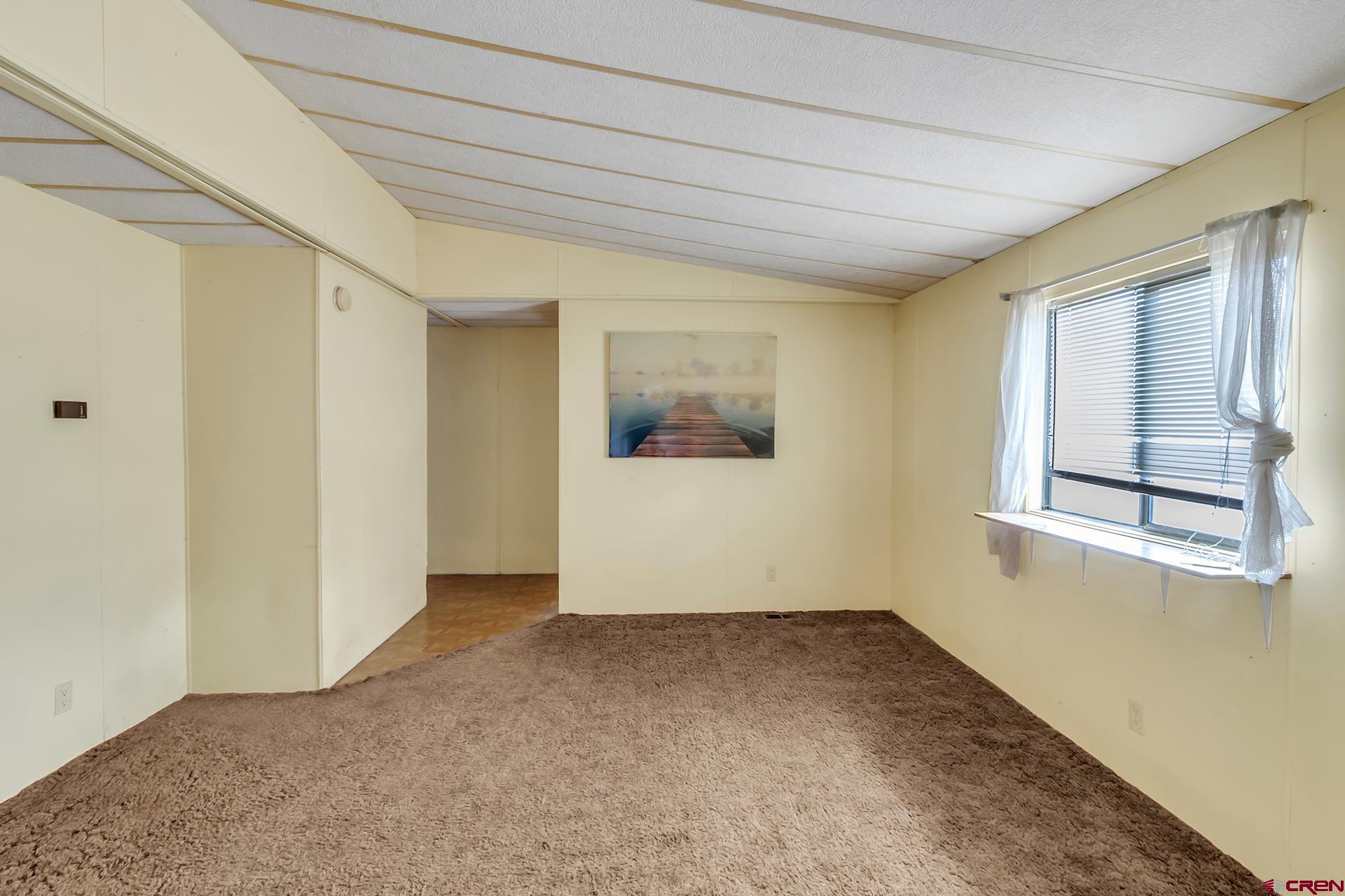 400 Riley Lane Delta, CO 81416 - Photo 15 of 35 an empty room with windows