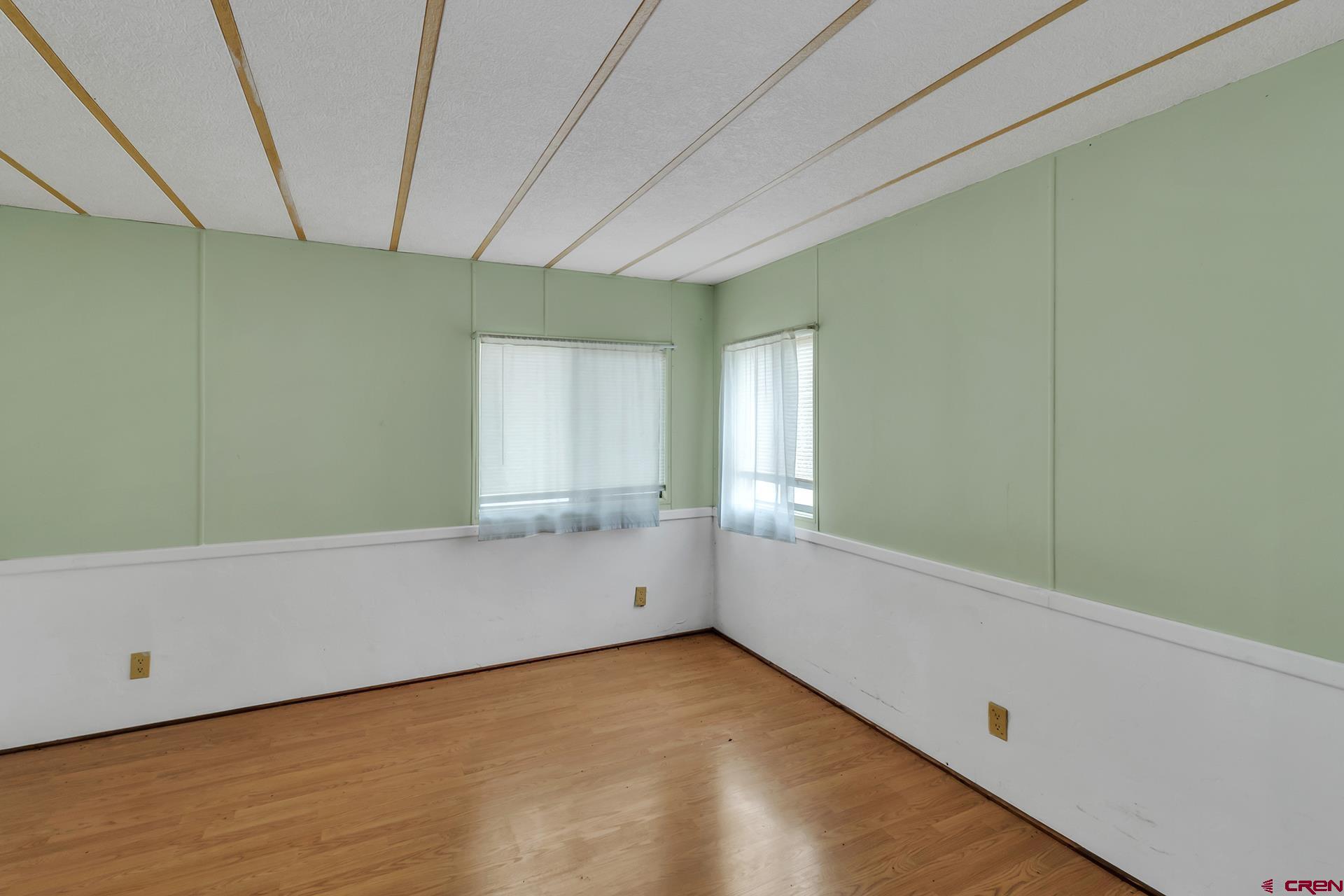 400 Riley Lane Delta, CO 81416 - Photo 17 of 35 a view of an empty room with a window