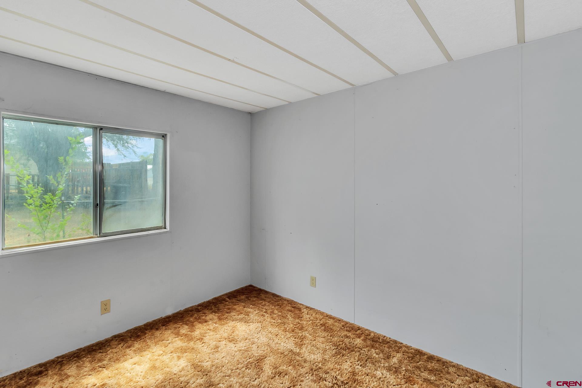 400 Riley Lane Delta, CO 81416 - Photo 22 of 35 a view of empty room with window