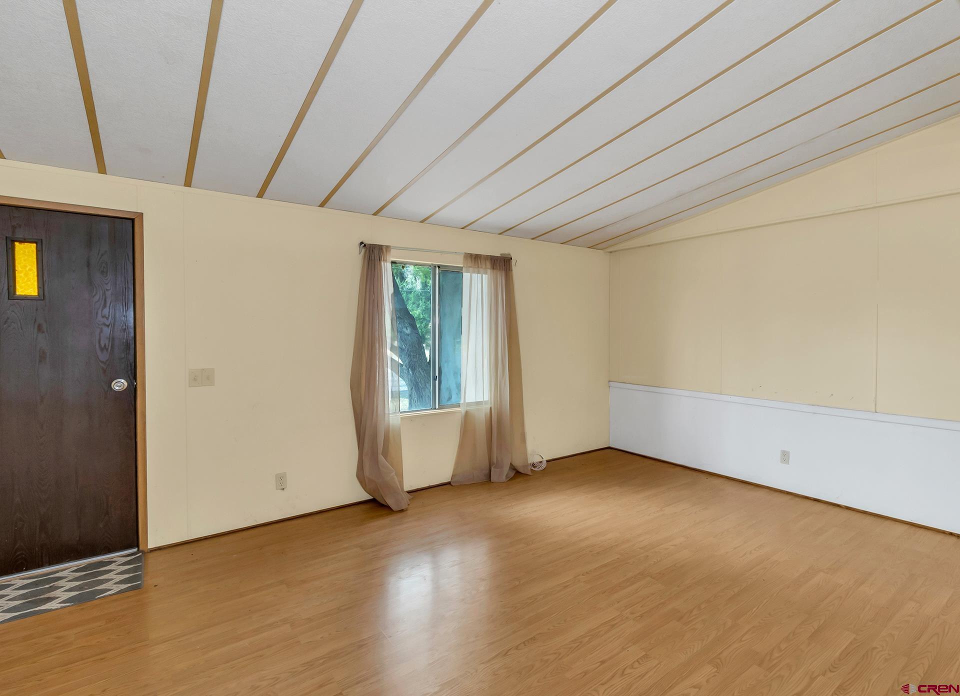 400 Riley Lane Delta, CO 81416 - Photo 10 of 35 an empty room with windows