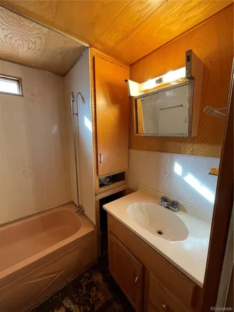 a bathroom with a sink and a toilet