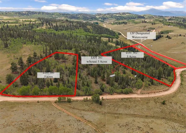 a view of swimming pool with a yard and lake view