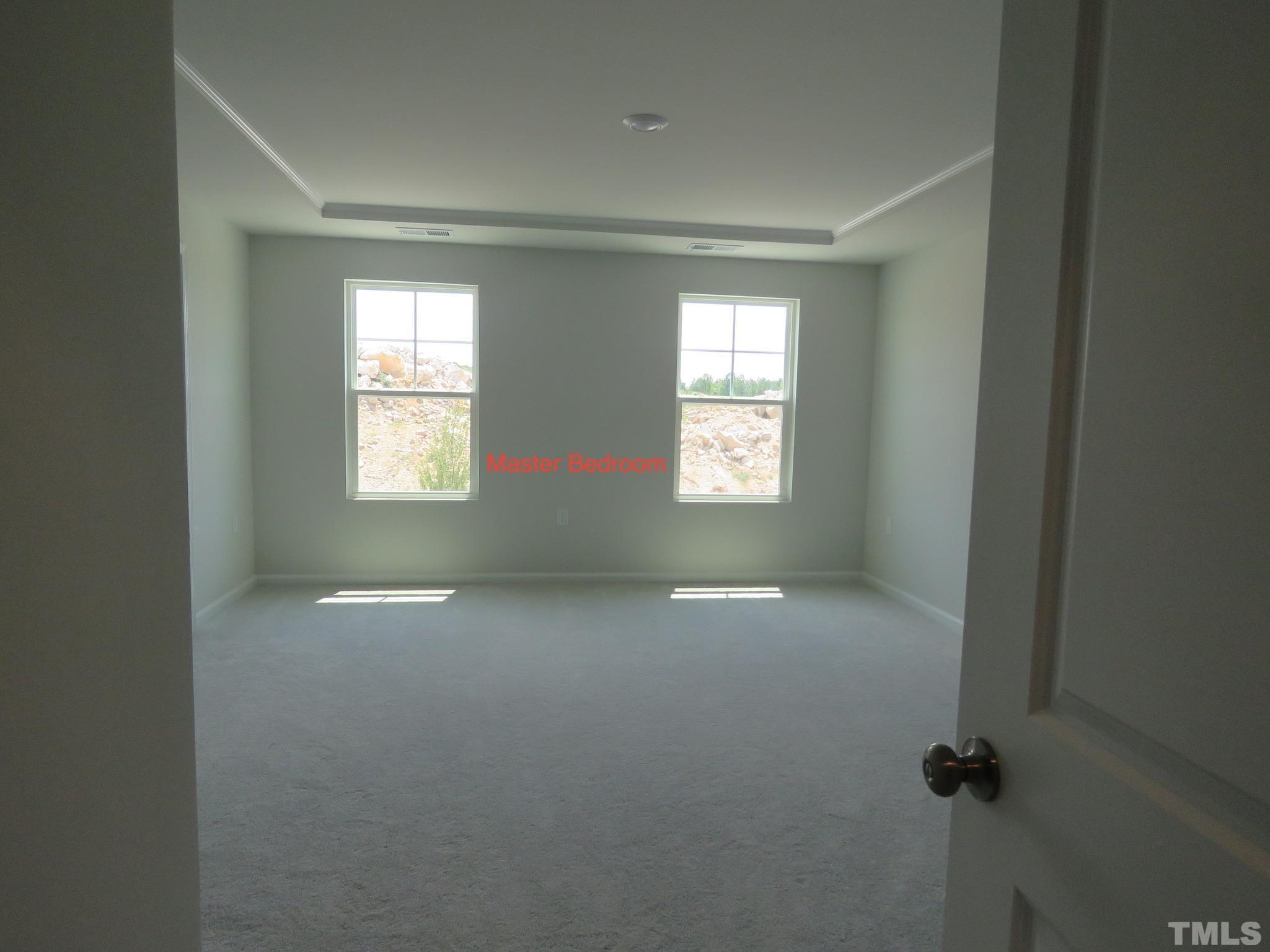 5118 Anamosa Street Raleigh, NC 27610 - Photo 15 of 36 a view of an empty room with a window