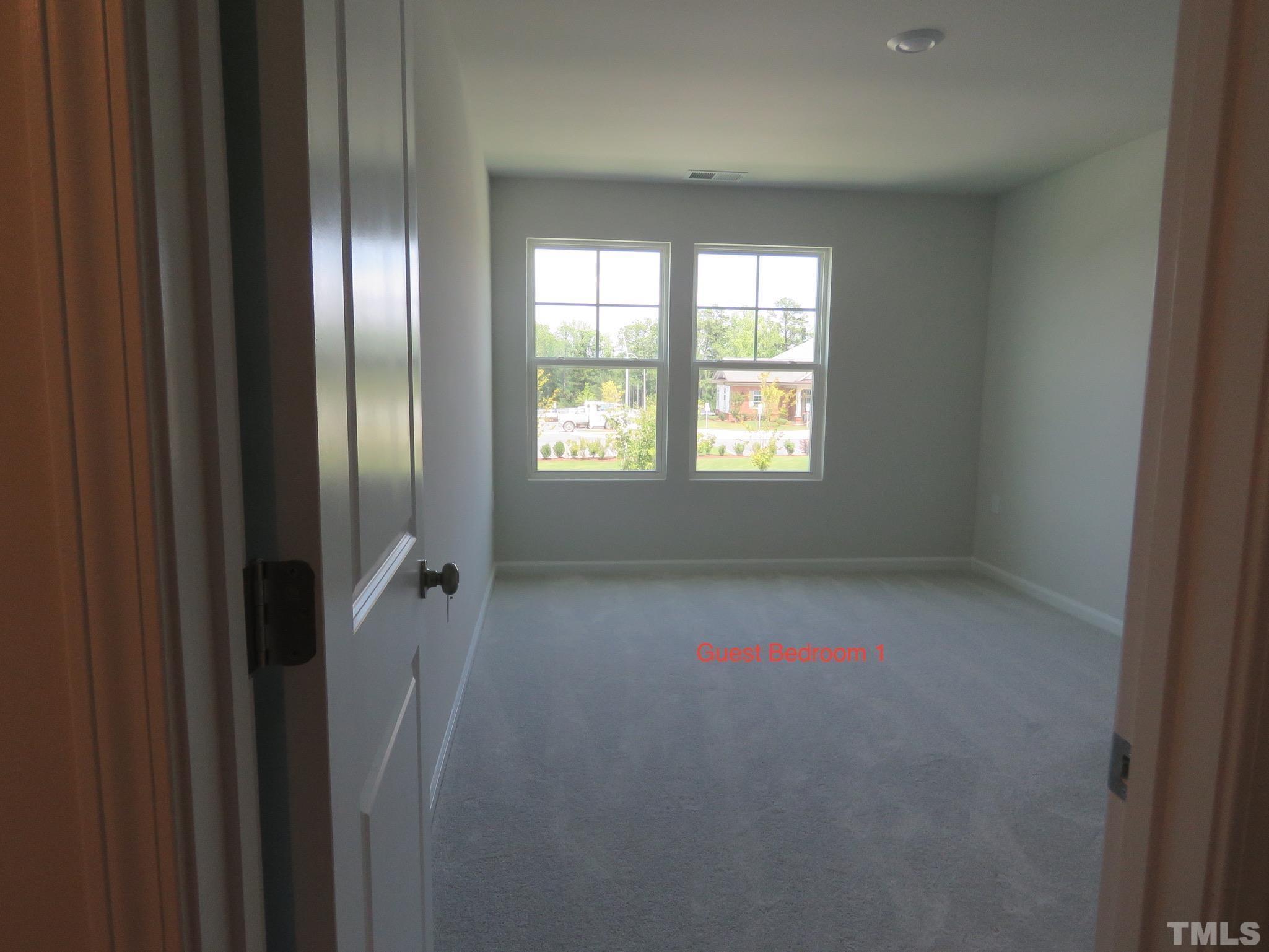 5118 Anamosa Street Raleigh, NC 27610 - Photo 19 of 36 a view of an empty room and window