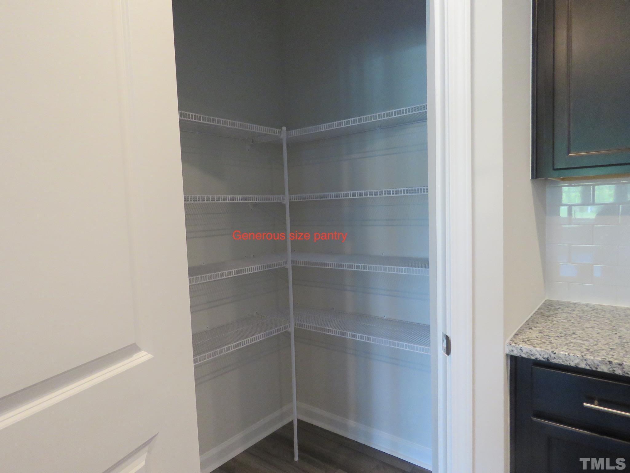 5118 Anamosa Street Raleigh, NC 27610 - Photo 20 of 36 a view of a room that has a washer and dryer