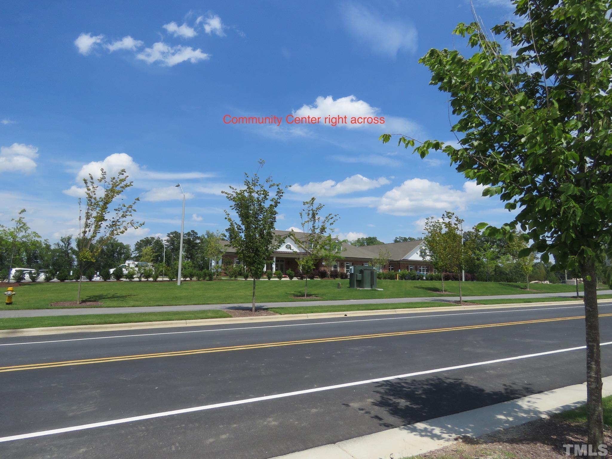 5118 Anamosa Street Raleigh, NC 27610 - Photo 24 of 36 a view of a playground and a yard