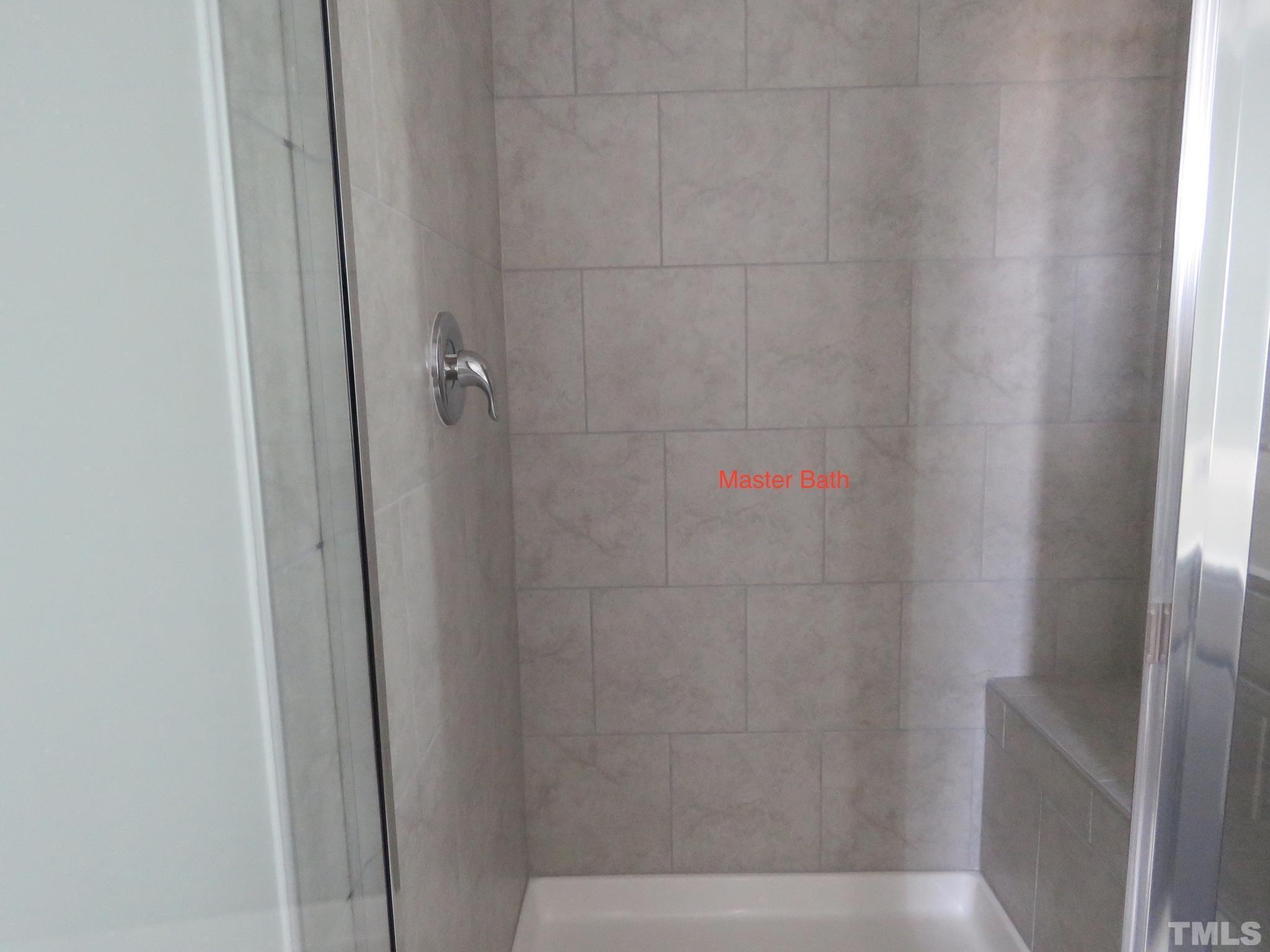 5118 Anamosa Street Raleigh, NC 27610 - Photo 34 of 36 a bathroom with a shower