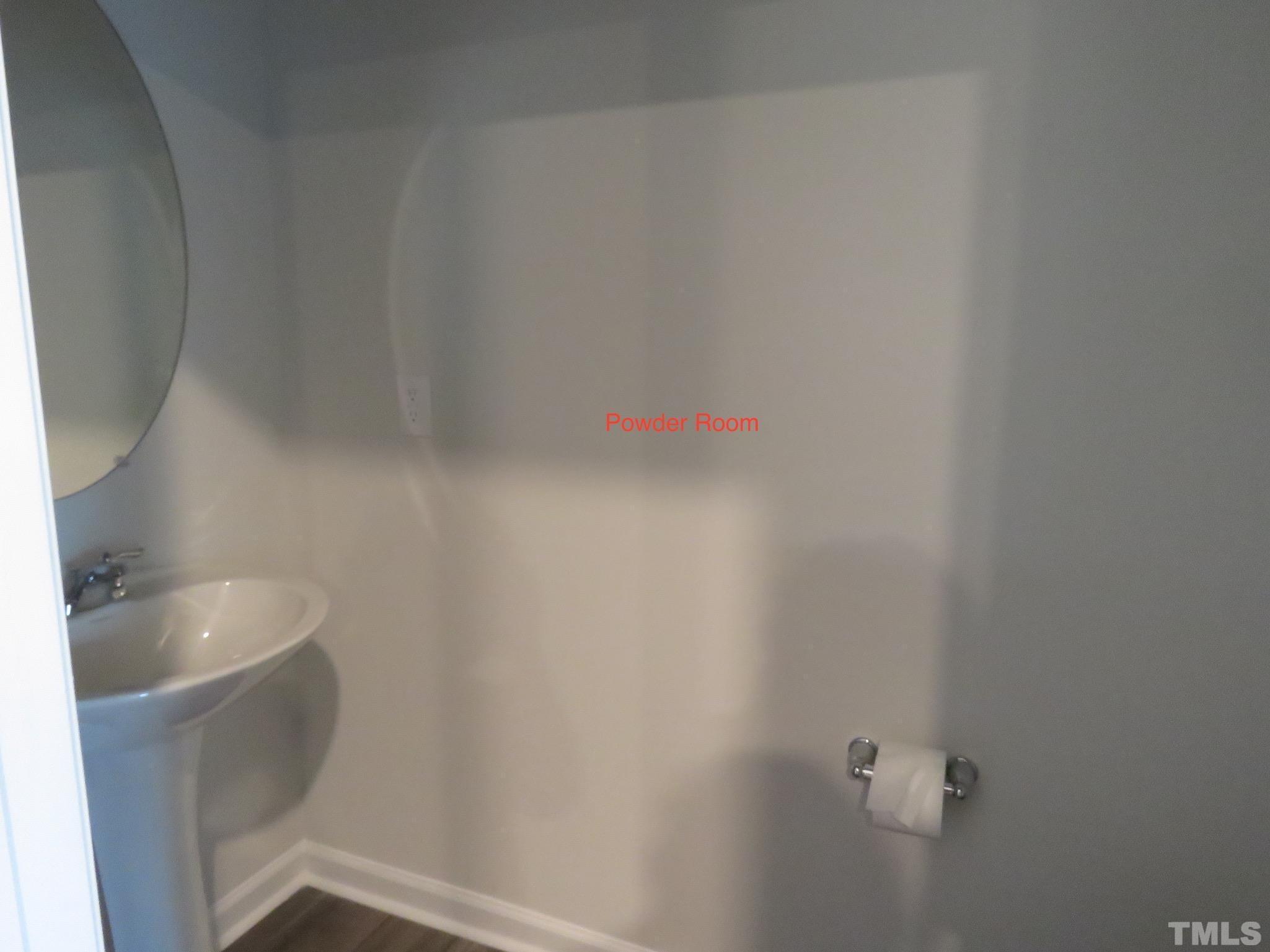 5118 Anamosa Street Raleigh, NC 27610 - Photo 8 of 36 a bathroom with a sink and bathtub