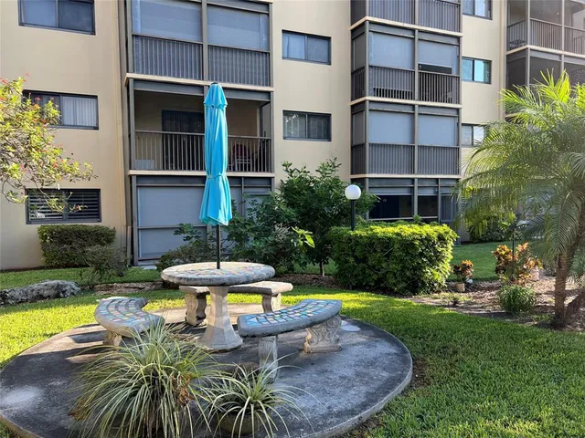 a view of a swimming pool with a patio