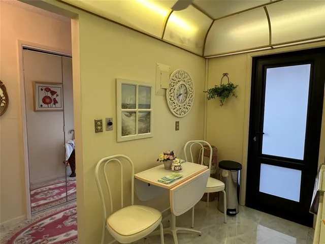 a bathroom with a sink a mirror and a toilet