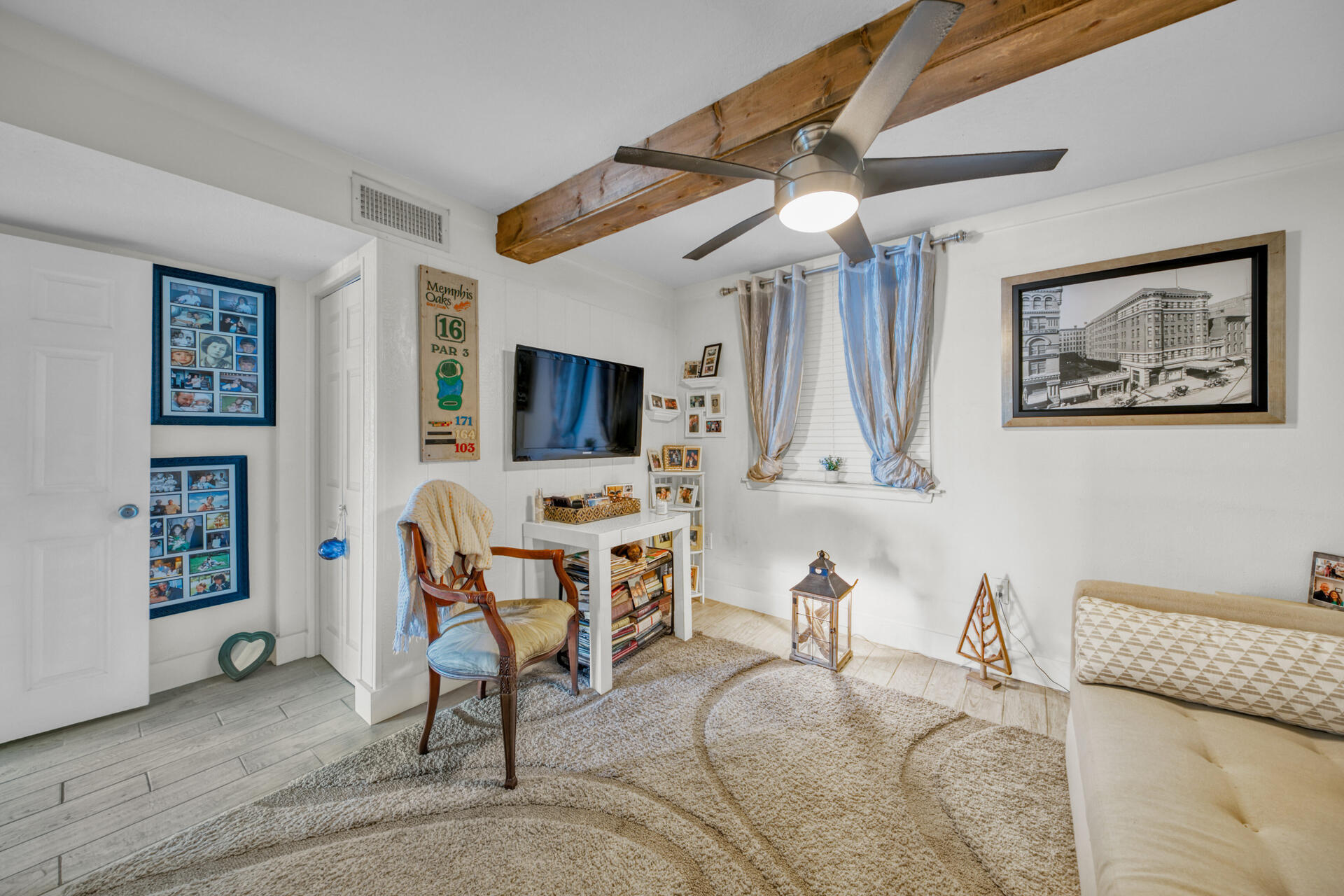 30 Moreno Point Road, Unit 101A Destin, FL 32541 - Photo 14 of 25 a living room with furniture and a flat screen tv