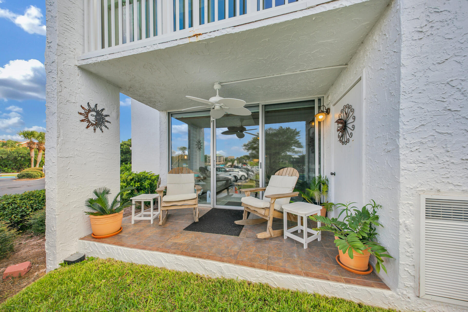 30 Moreno Point Road, Unit 101A Destin, FL 32541 - Photo 17 of 25 a outdoor living space with furniture