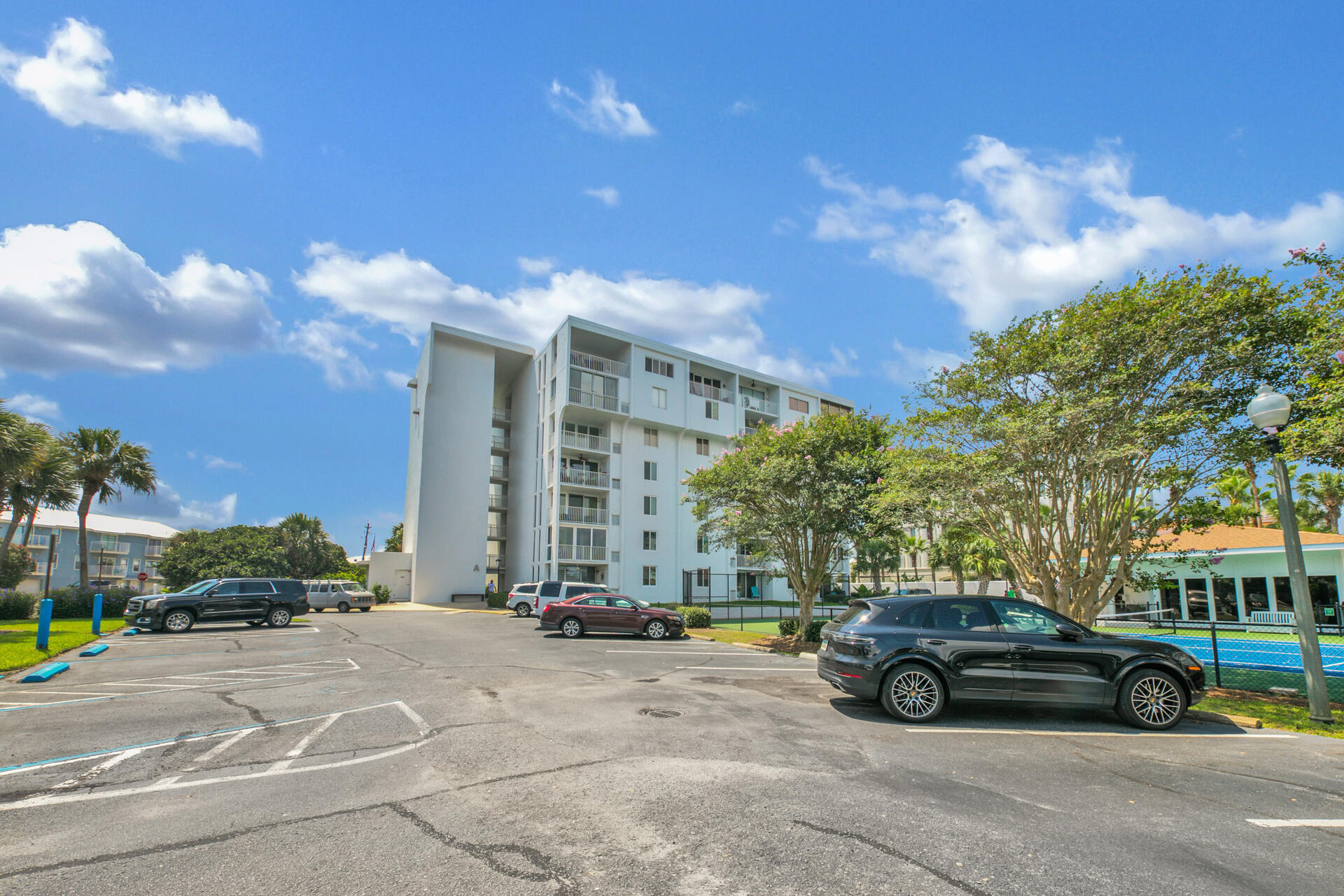 30 Moreno Point Road, Unit 101A Destin, FL 32541 - Photo 22 of 25 a view of street with parked cars