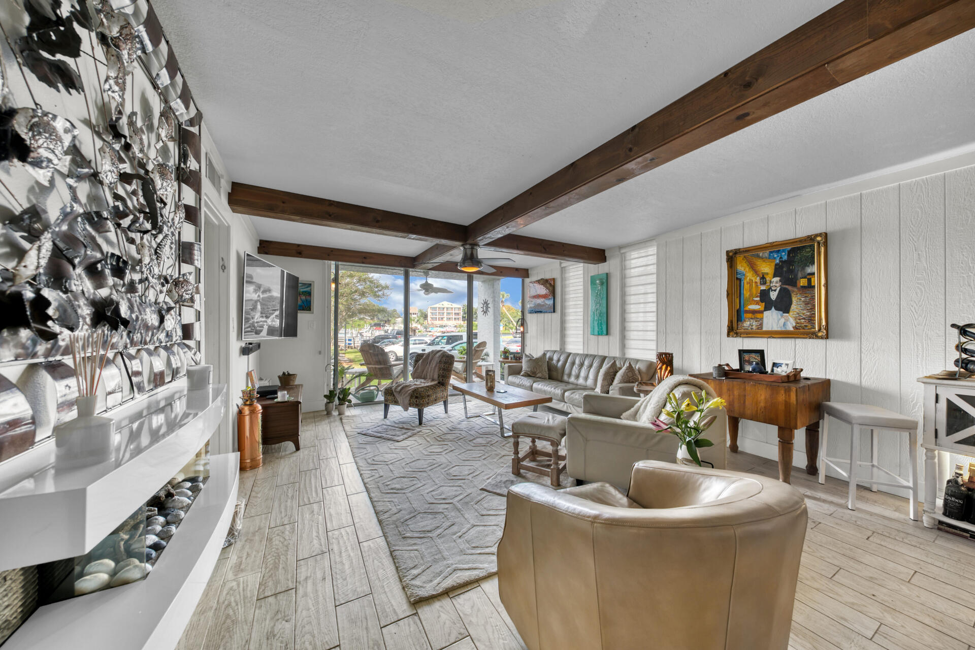 30 Moreno Point Road, Unit 101A Destin, FL 32541 - Photo 5 of 25 a living room with furniture and a large window