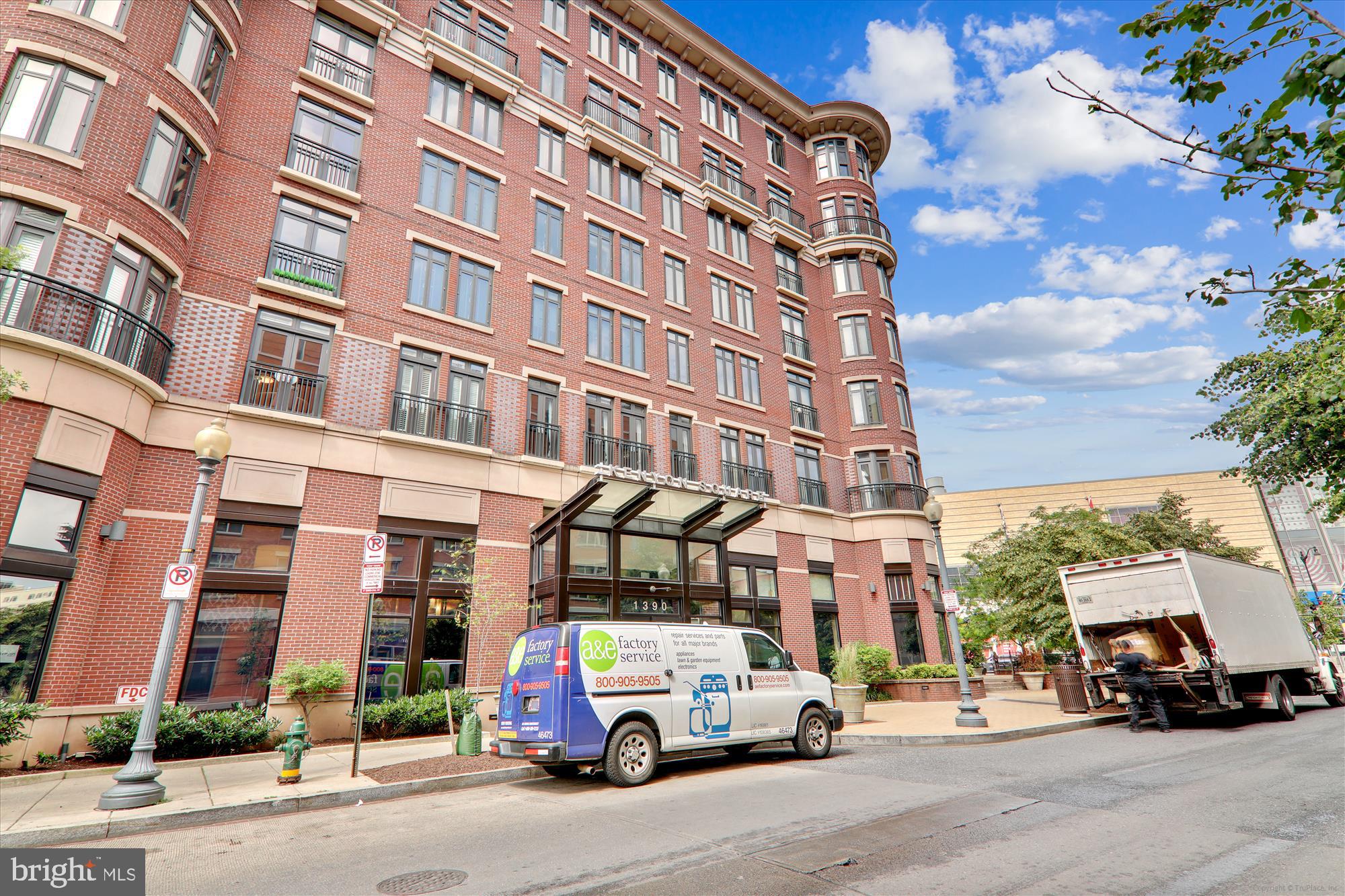 1390 Kenyon Street Northwest, Unit 416 Washington, DC 20010 - Photo 30 of 58 a car parked in front of a building