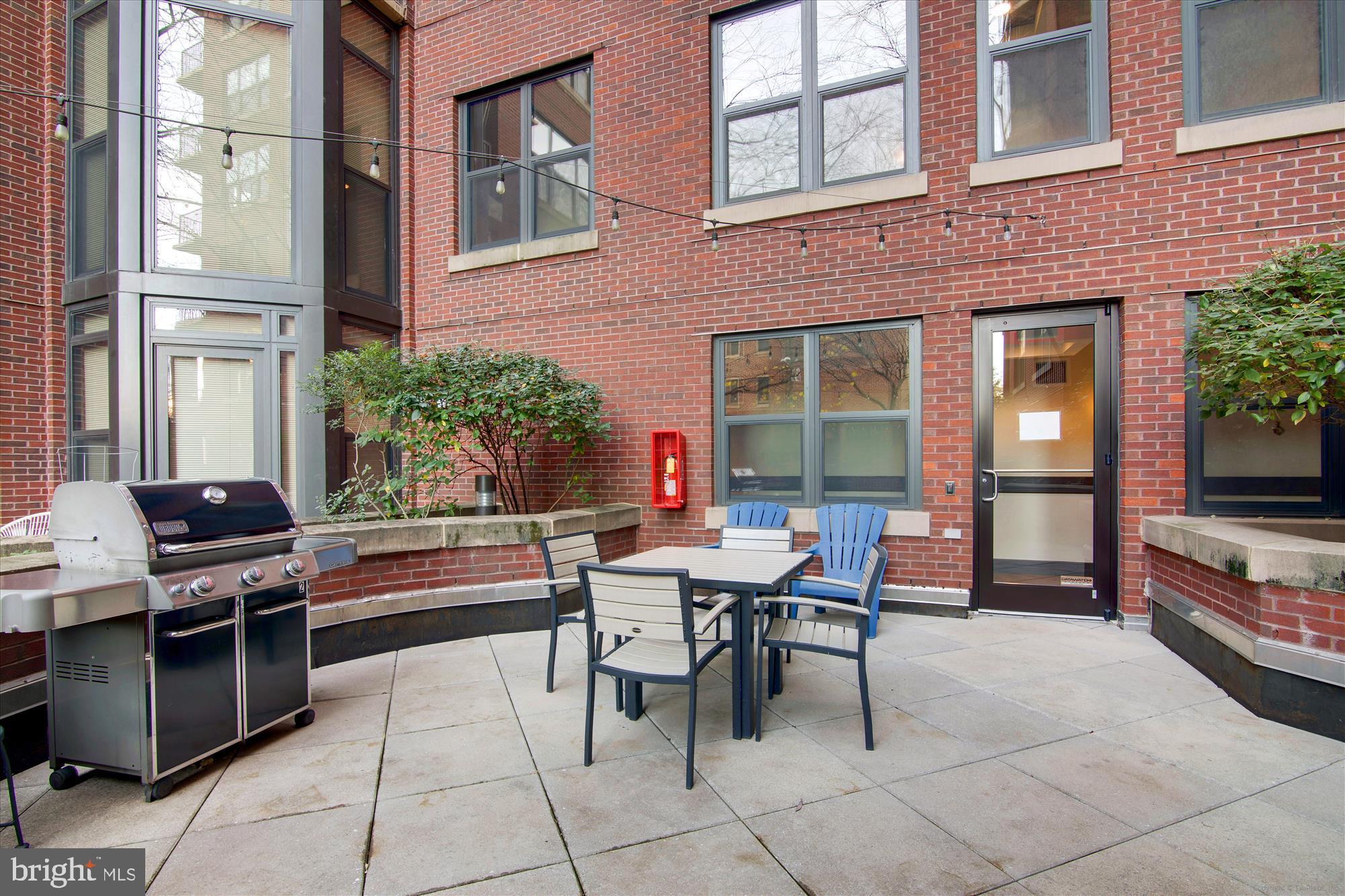 1390 Kenyon Street Northwest, Unit 416 Washington, DC 20010 - Photo 34 of 58 a outdoor space with a couch