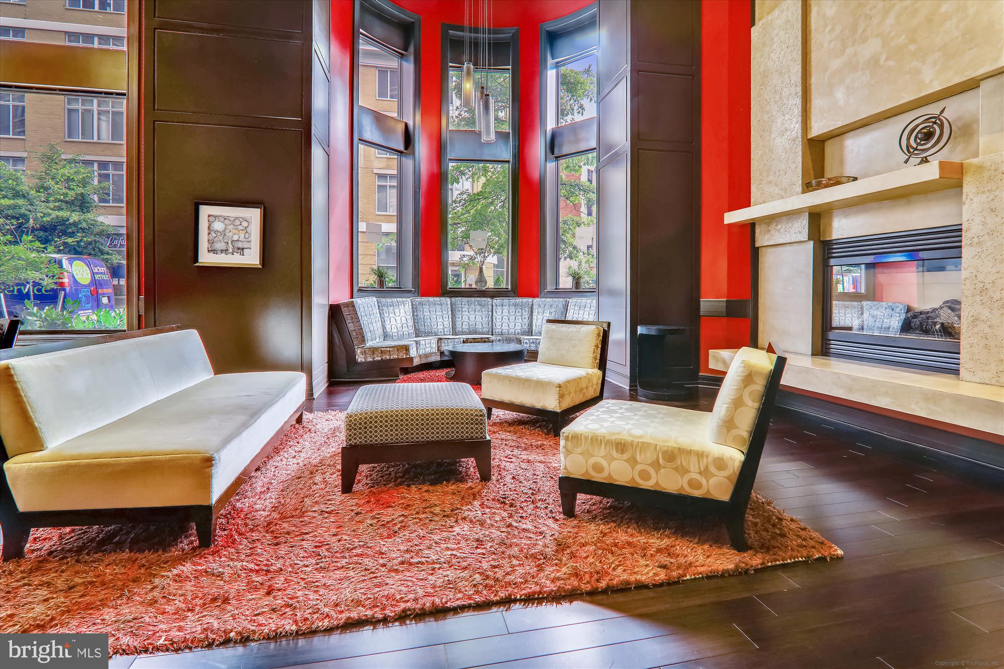 1390 Kenyon Street Northwest, Unit 416 Washington, DC 20010 - Photo 38 of 58 a living room with furniture and a rug