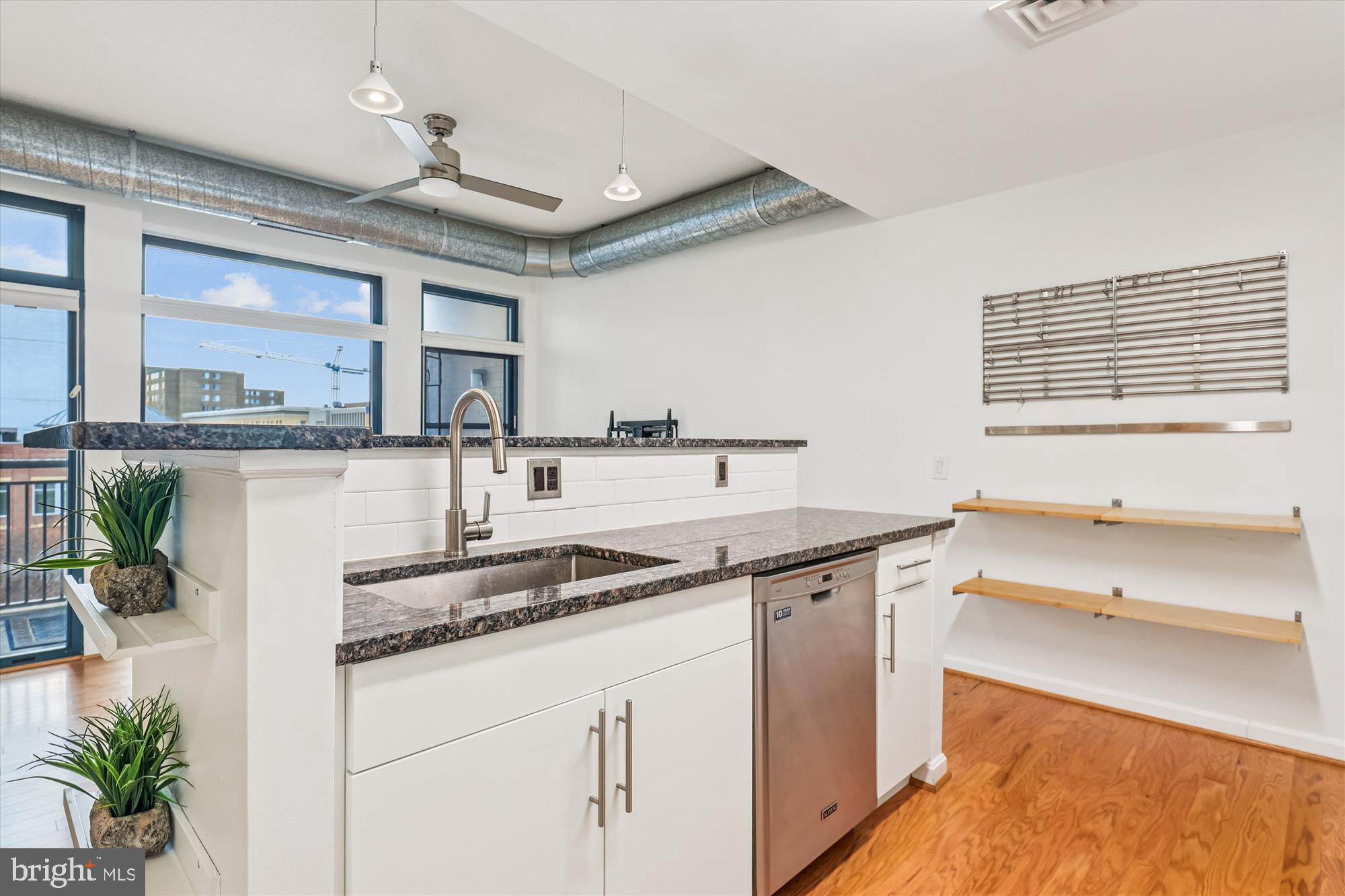 1390 Kenyon Street Northwest, Unit 416 Washington, DC 20010 - Photo 6 of 58 a kitchen with a sink and cabinets