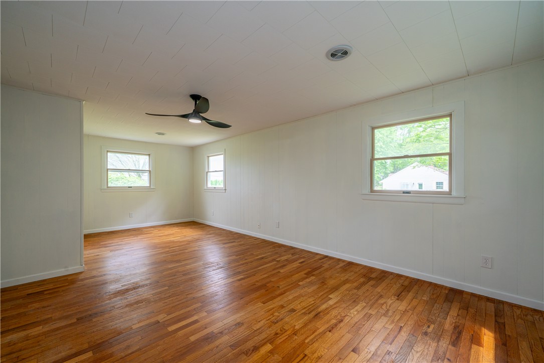 11296 Pansing Road Brookville, OH 45309 - Photo 17 of 53 This spacious room features ample natural light and durable hardwood flooring.