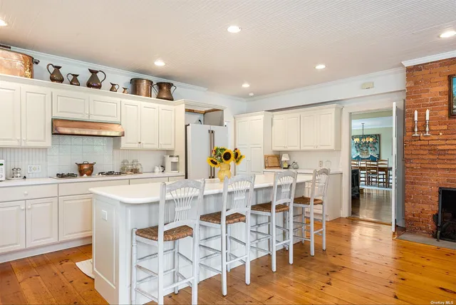 a view of a living room and balcony