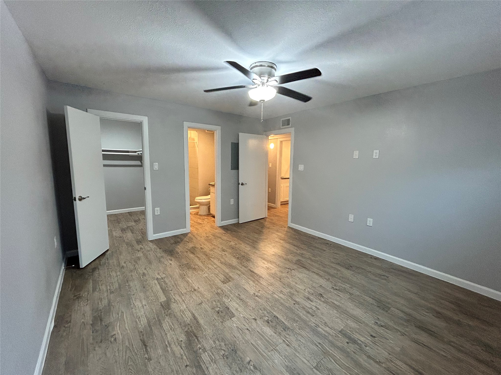 2810 Beauchamp Street, Unit 19 Houston, TX 77009 - Photo 15 of 21 wooden floor in an empty room with a window