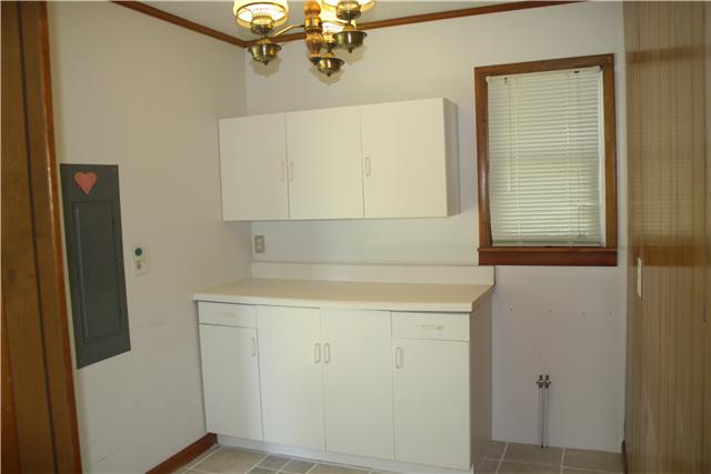 115 Sears Roebuck Road Tullahoma, TN 37388 - Photo 7 of 18 This is an awesome mud room complete with cabinets, folding table, and place for utility sink. Oh...The washer and dryer are also included!