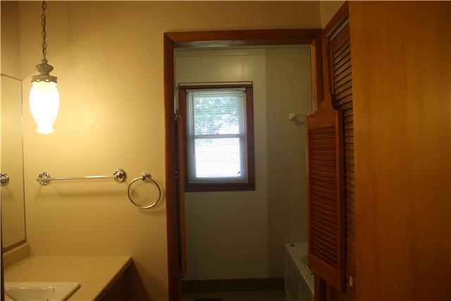 115 Sears Roebuck Road Tullahoma, TN 37388 - Photo 9 of 18 This large bathroom has plenty of storage space with linen closets and cabinets