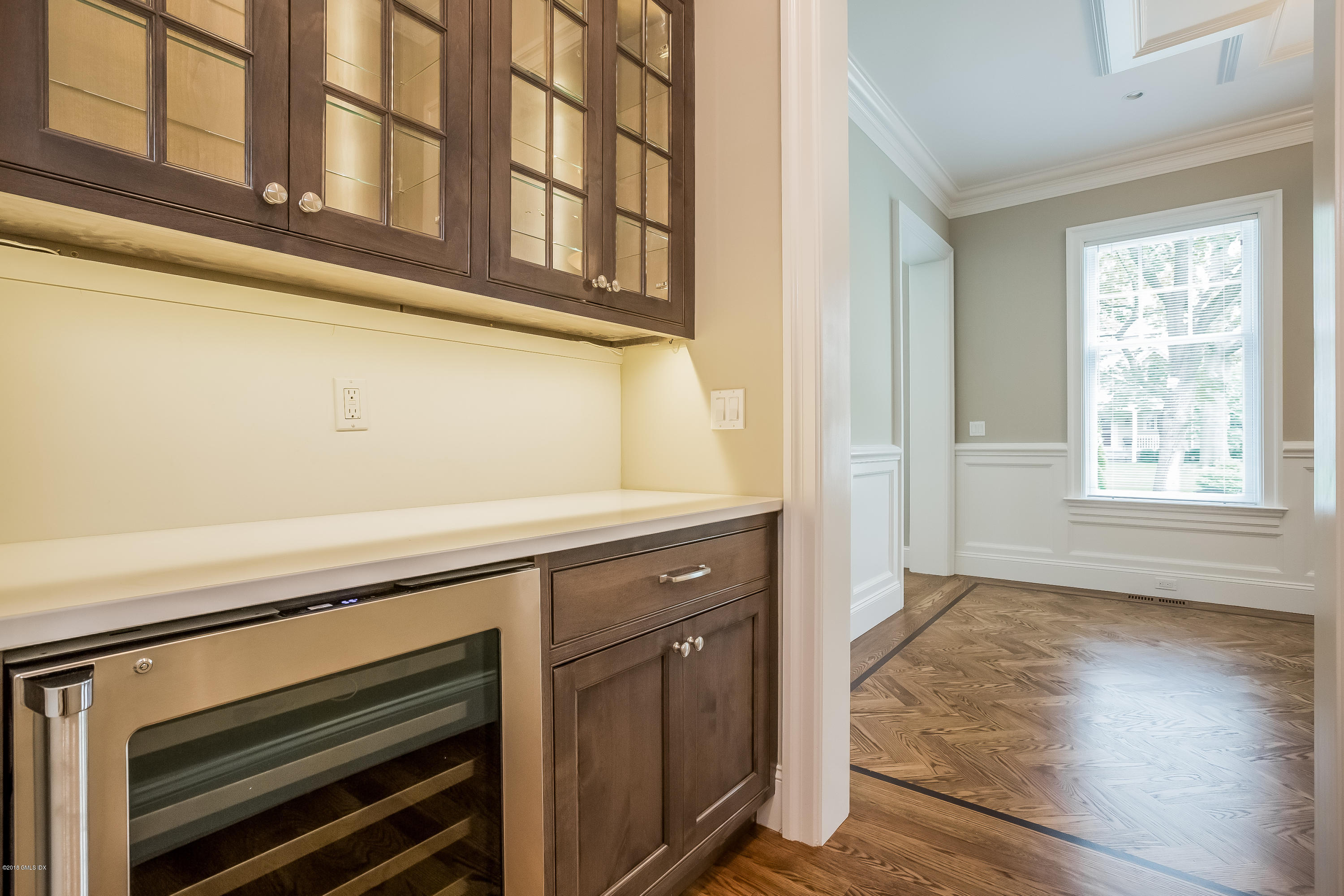 14 Palmer Terrace Riverside, CT 06878 - Photo 14 of 33 a kitchen with stainless steel appliances cabinets and wooden floor