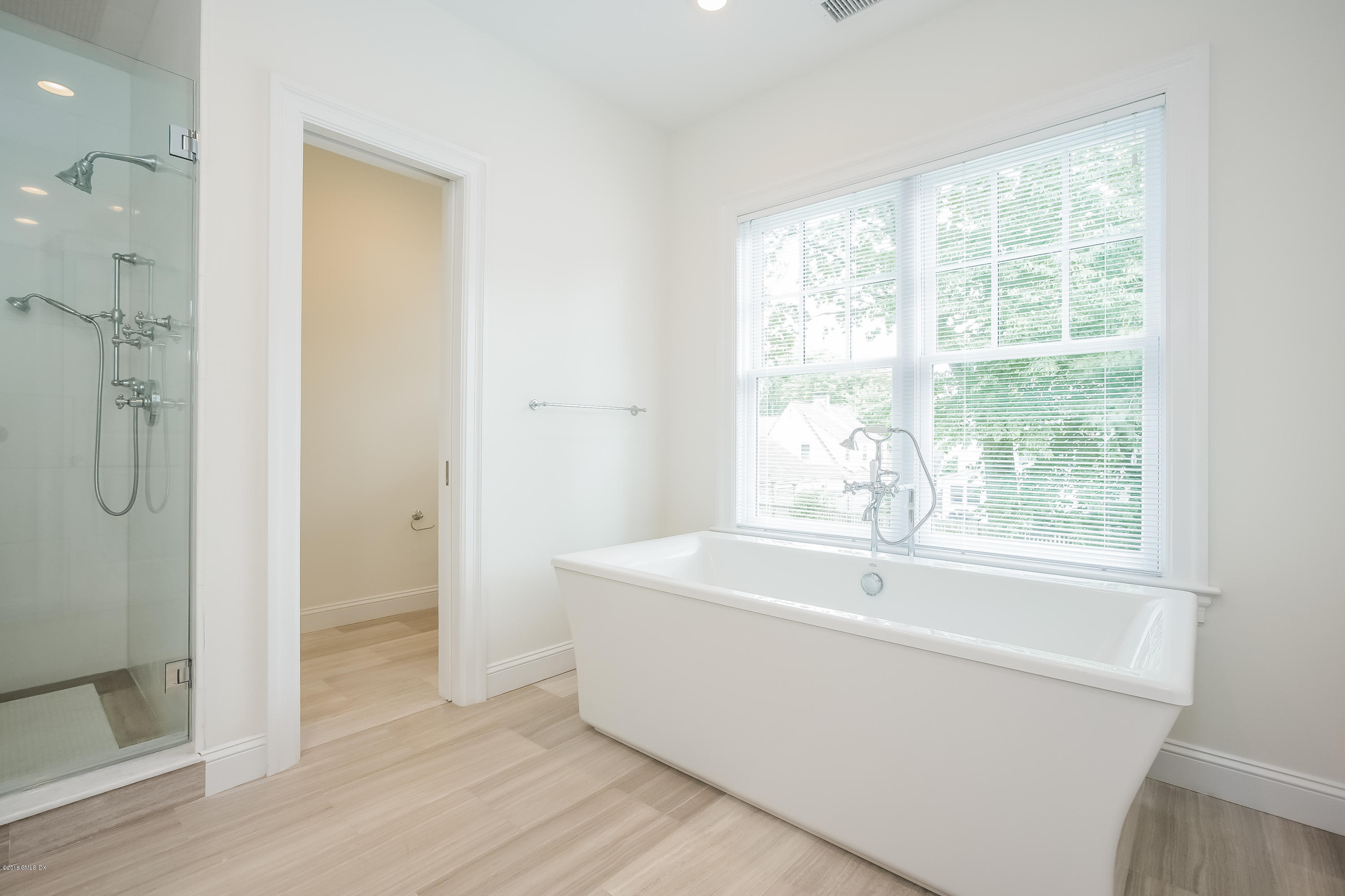 14 Palmer Terrace Riverside, CT 06878 - Photo 20 of 33 a white bath tub sitting next to a window