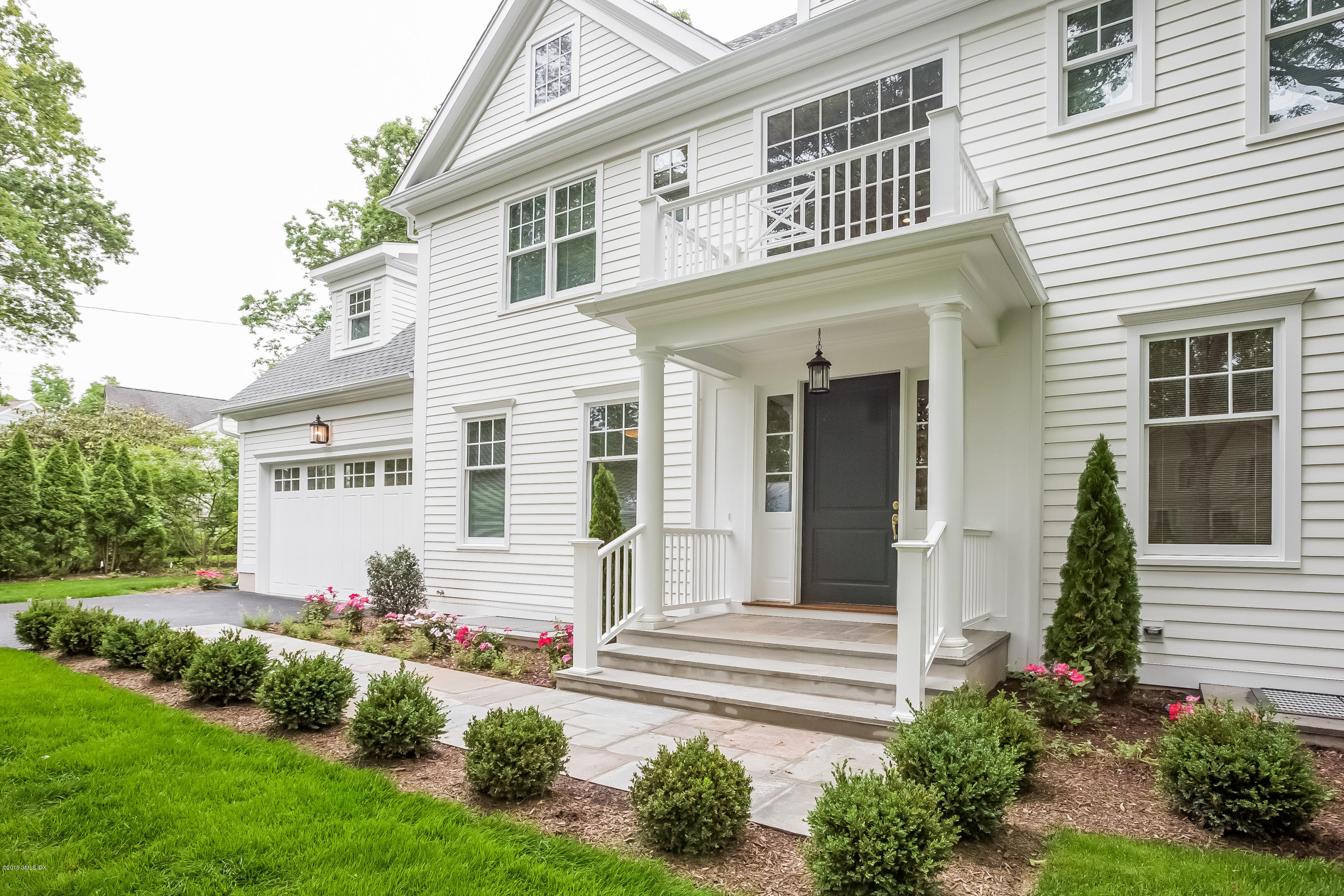 14 Palmer Terrace Riverside, CT 06878 - Photo 3 of 33 a front view of a house with garden