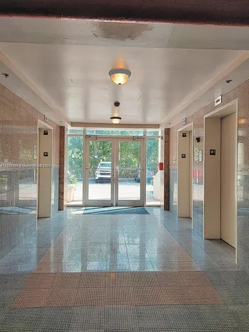 a front view of a house with swimming pool