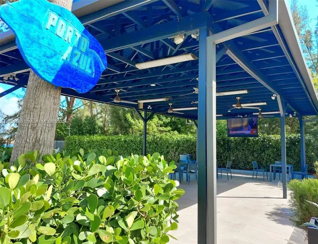 a view of a porch with furniture