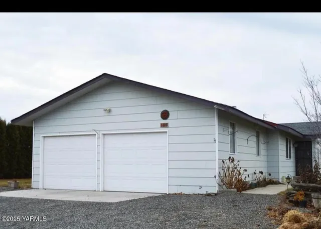 a house view with a backyard space