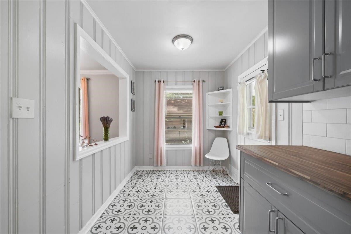 1049 McEvers Road Memphis, TN 38111 - Photo 20 of 28 a bathroom with a granite countertop sink a toilet and a shower