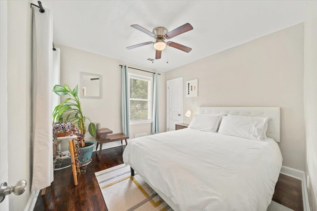 1049 McEvers Road Memphis, TN 38111 - Photo 26 of 28 a bedroom with a bed and a chandelier