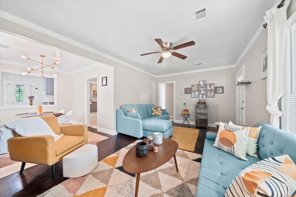 1049 McEvers Road Memphis, TN 38111 - Photo 10 of 28 a living room with furniture and wooden floor
