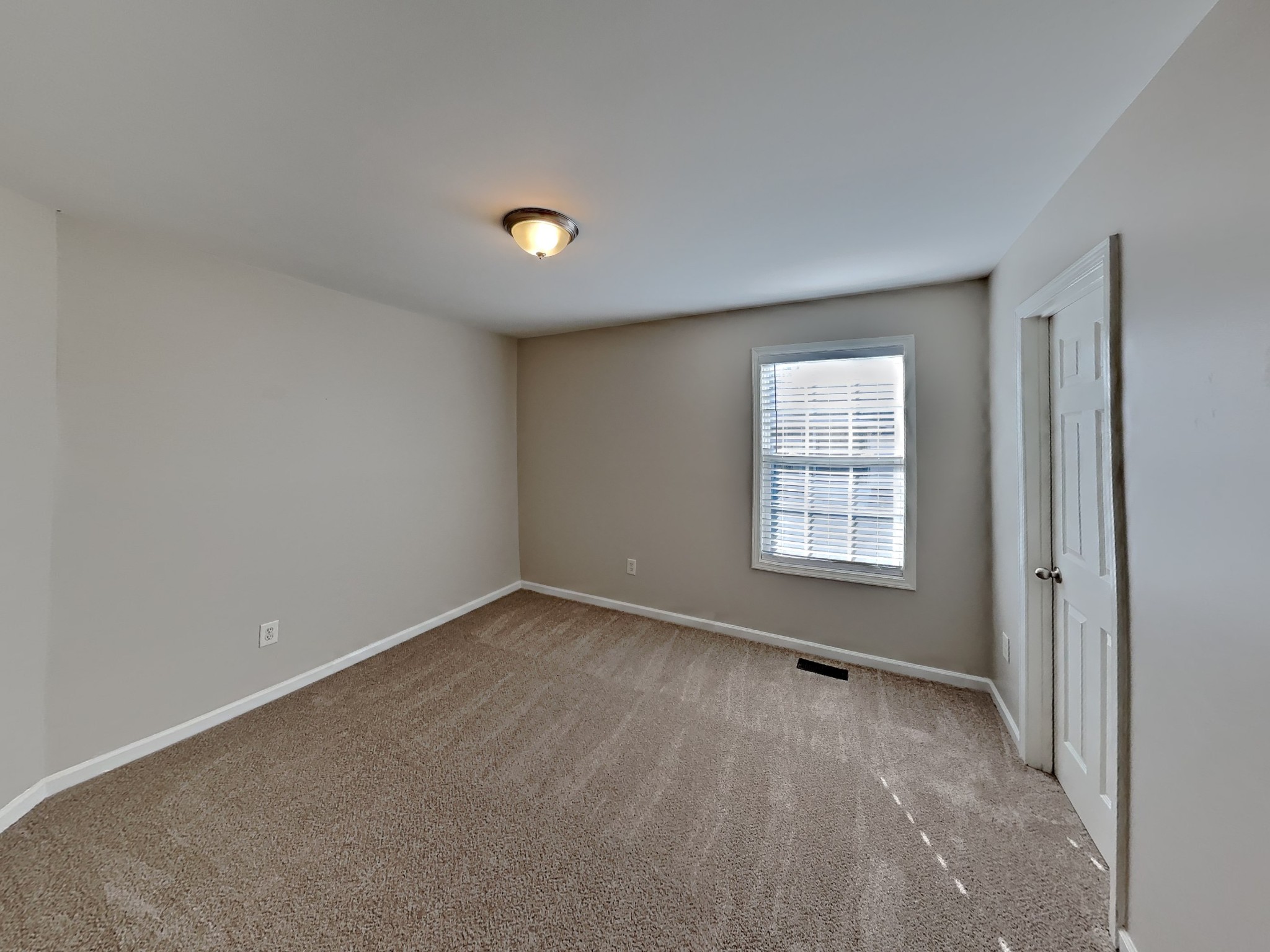 1721 Stephenson Lane Spring Hill, TN 37174 - Photo 12 of 16 a view of an empty room with a window