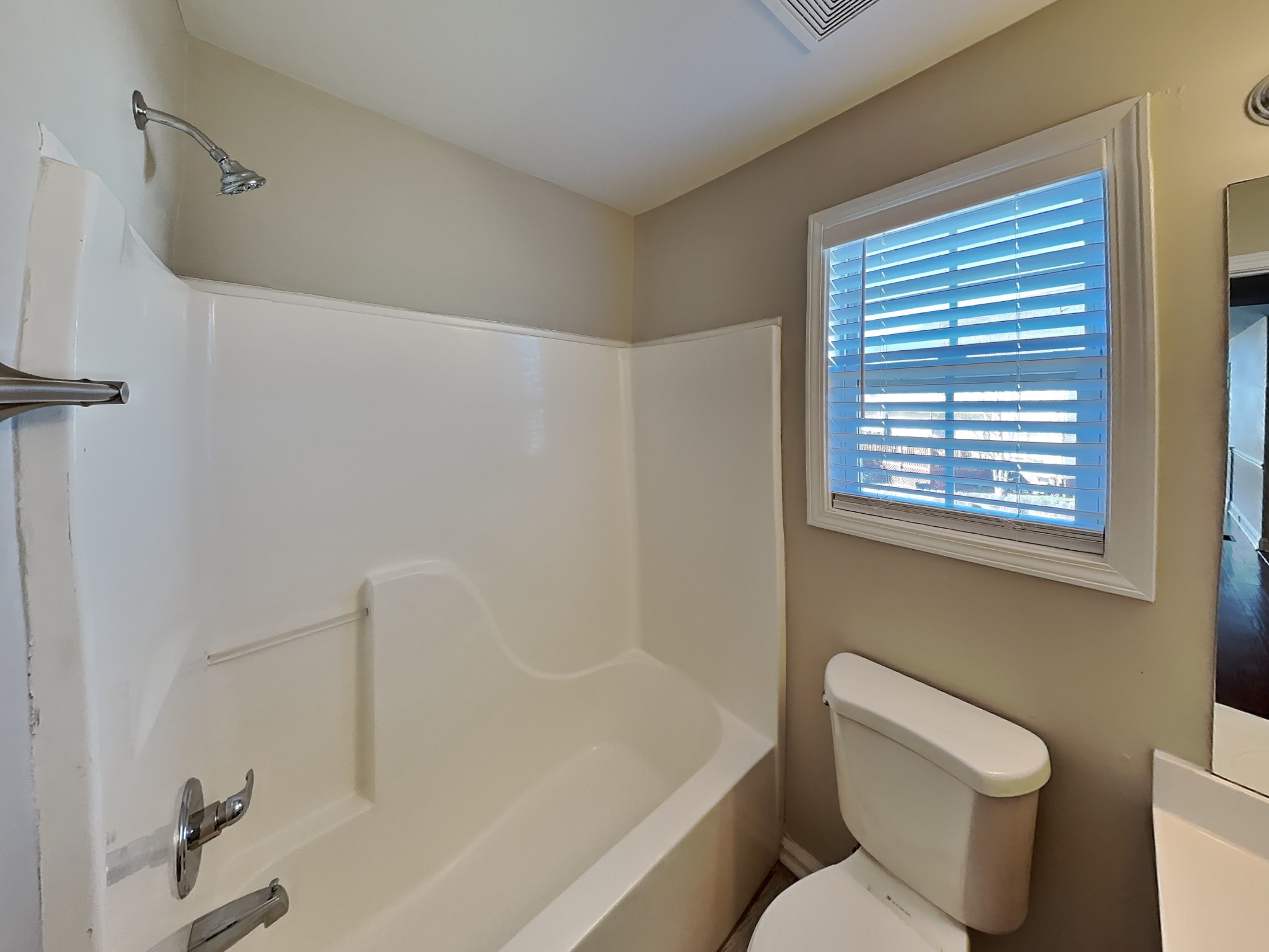 1721 Stephenson Lane Spring Hill, TN 37174 - Photo 14 of 16 a white toilet sitting next to a bath tub