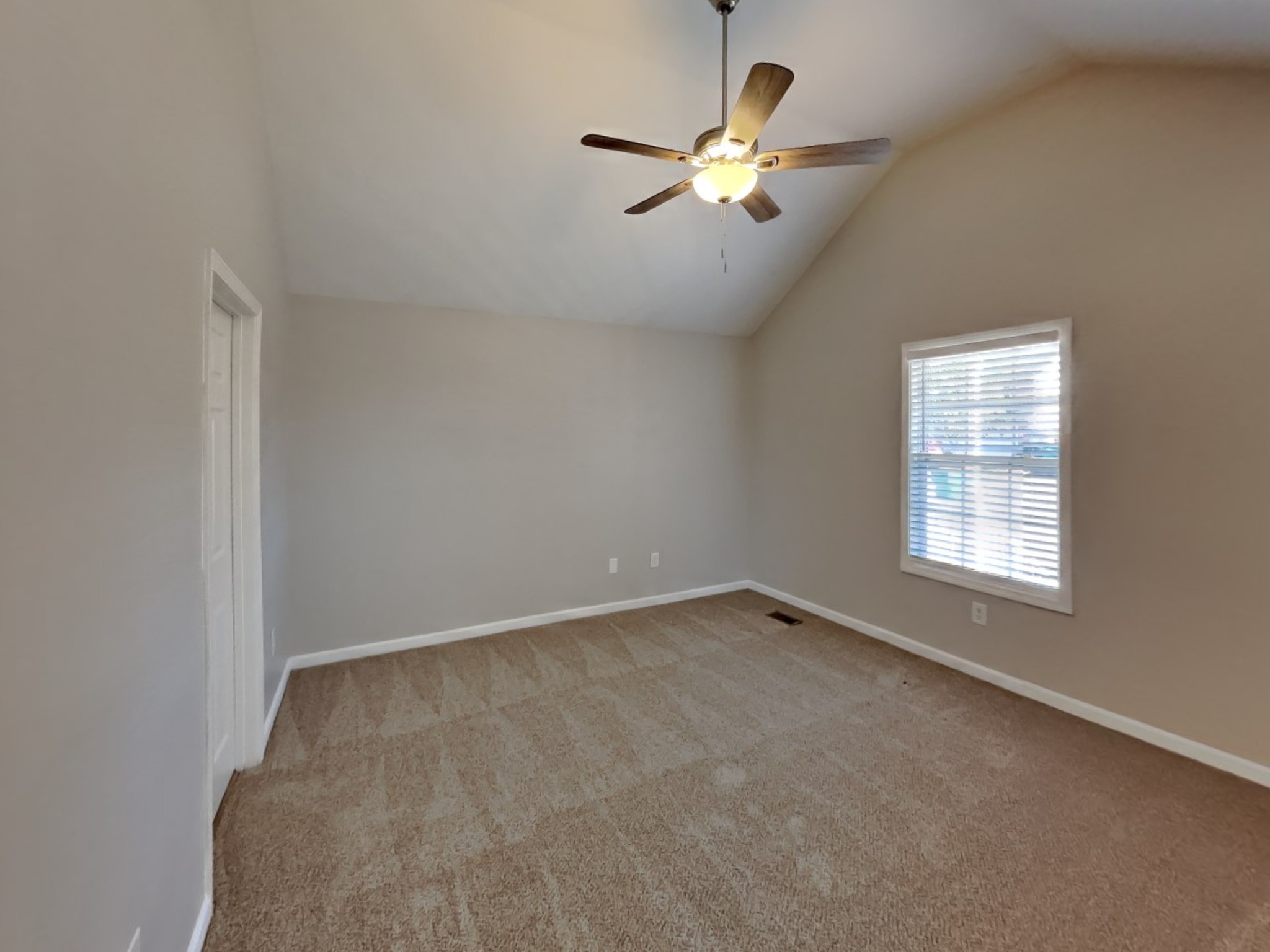 1721 Stephenson Lane Spring Hill, TN 37174 - Photo 7 of 16 an empty room with chandelier fan and windows