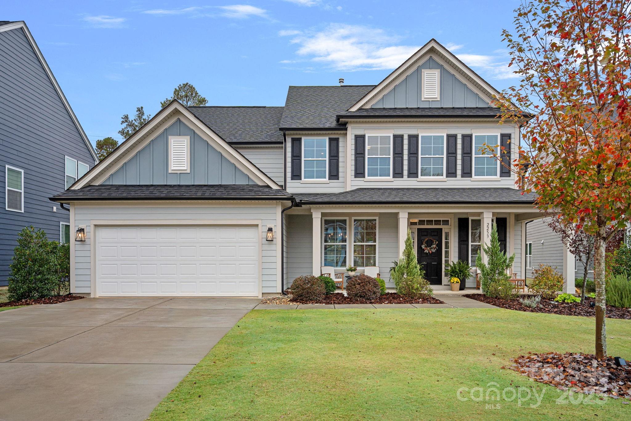 2253 Masons Bend Drive Fort Mill, SC 29708 - Photo 1 of 48 a front view of a house with garden