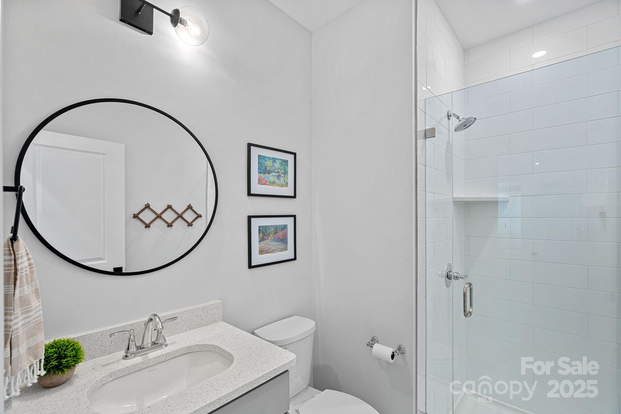 2253 Masons Bend Drive Fort Mill, SC 29708 - Photo 18 of 48 a bathroom with a sink and a mirror