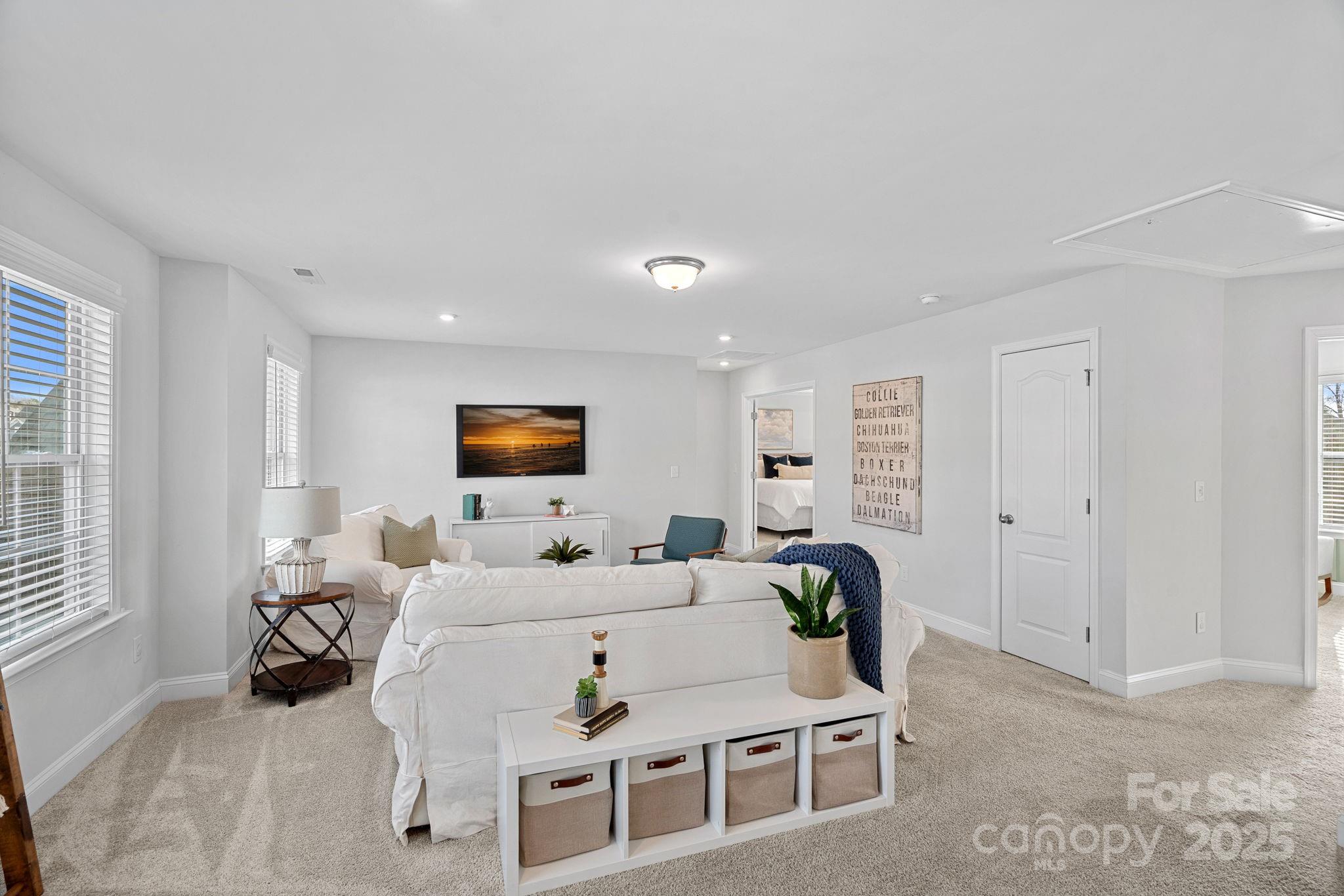2253 Masons Bend Drive Fort Mill, SC 29708 - Photo 20 of 48 a living room with furniture and a window