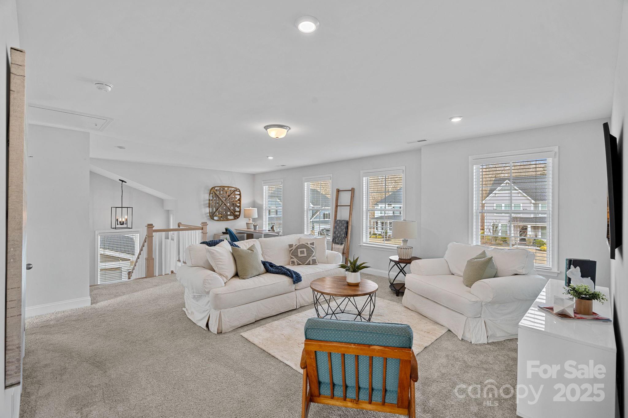 2253 Masons Bend Drive Fort Mill, SC 29708 - Photo 21 of 48 a living room with furniture and a window