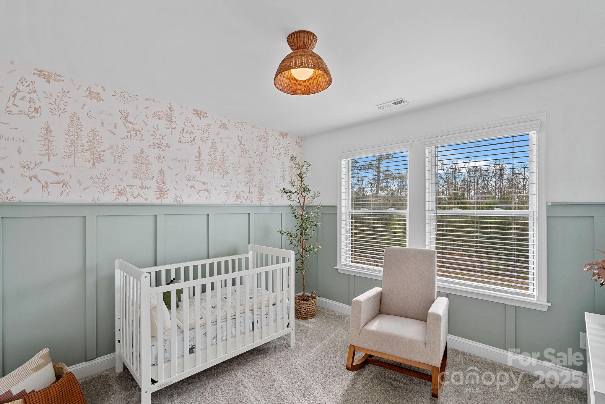 2253 Masons Bend Drive Fort Mill, SC 29708 - Photo 30 of 48 a bedroom with a bed and window