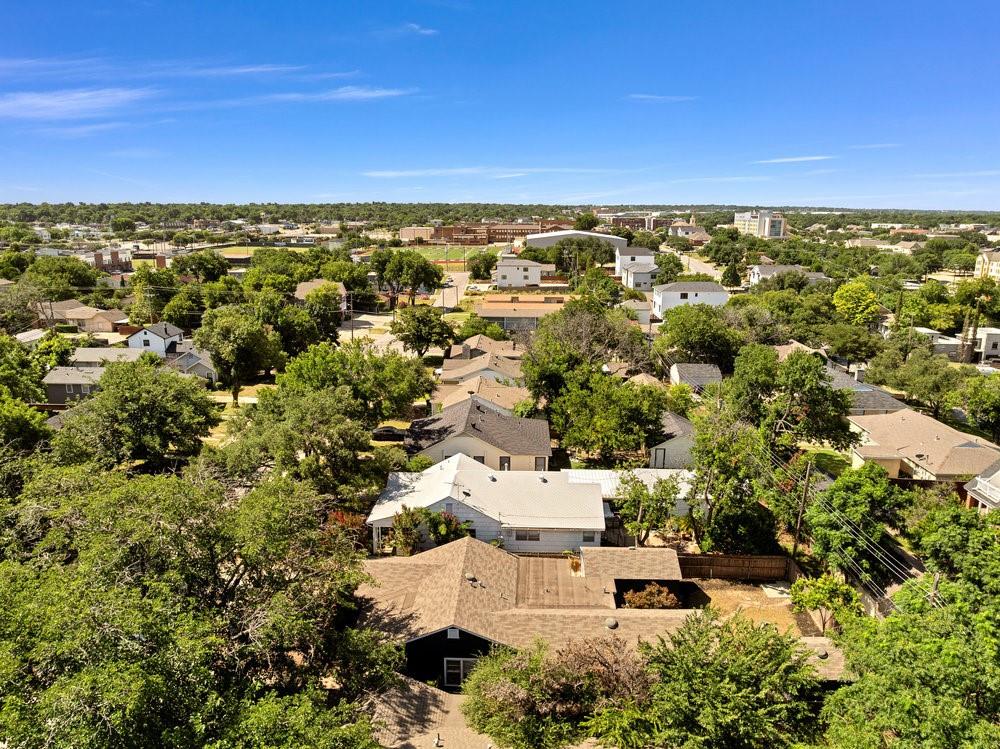 2716 Wayside Avenue Fort Worth, TX 76110 - Photo 32 of 34 an aerial view of a house with a yard