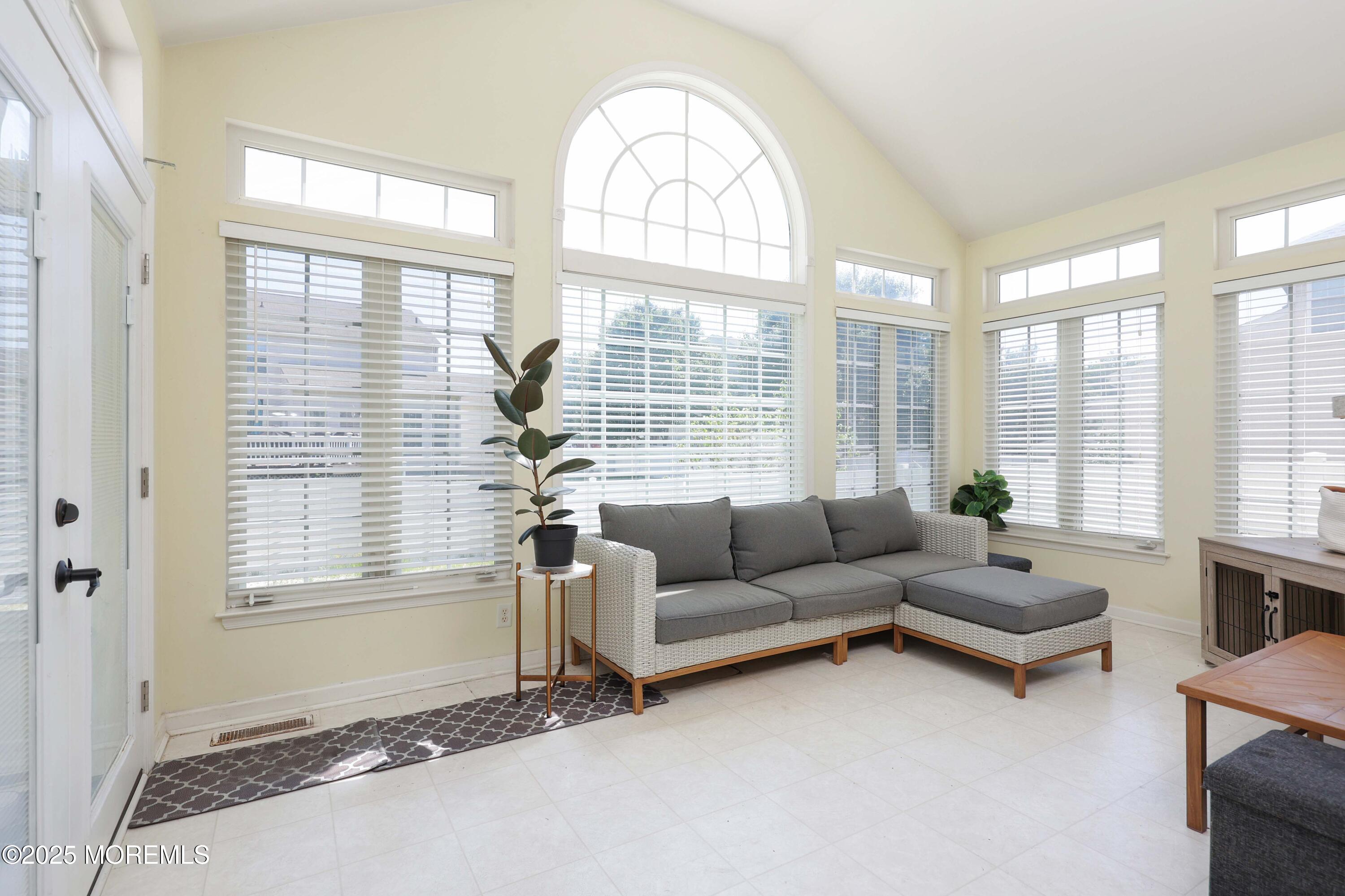 32 Firestone Drive Howell, NJ 07731 - Photo 14 of 43 a living room with furniture and a large window